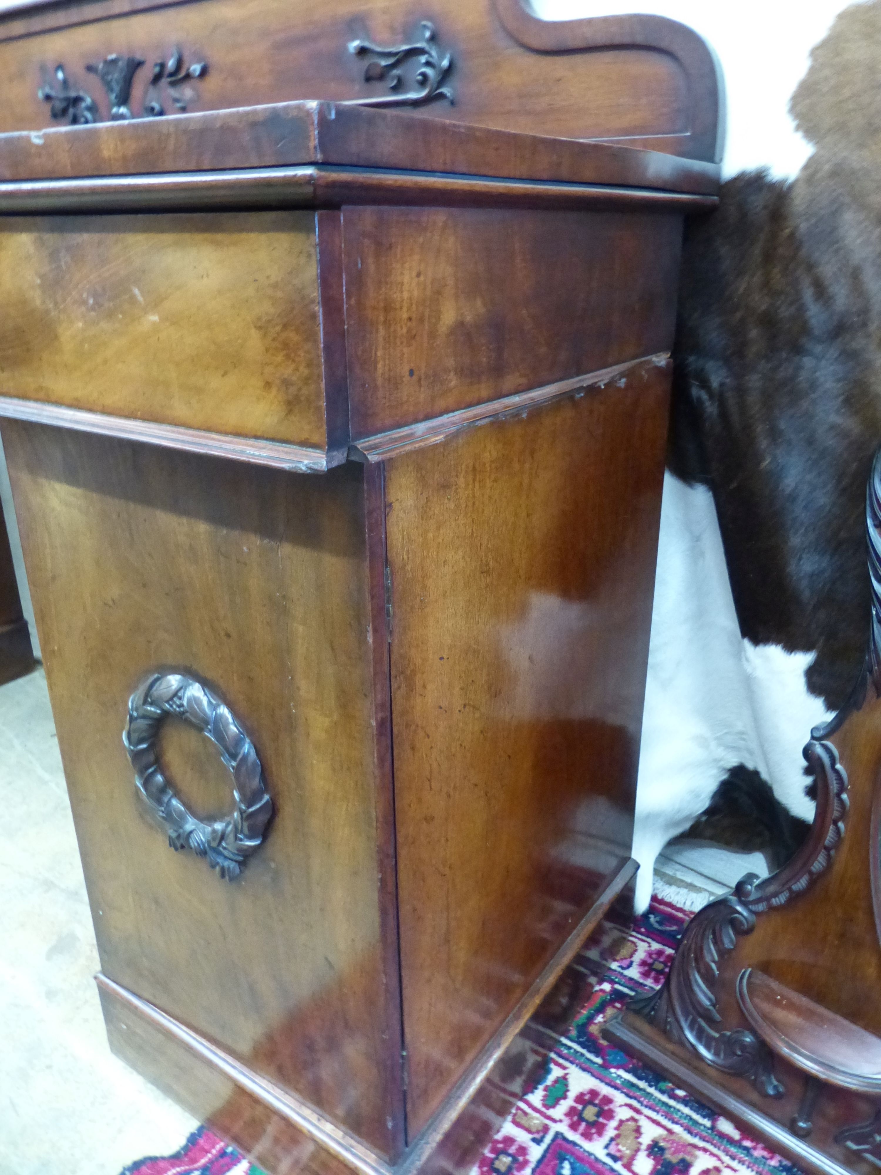 A Victorian mahogany break front pedestal sideboard, length 184cm, depth 56cm, height 125cm.